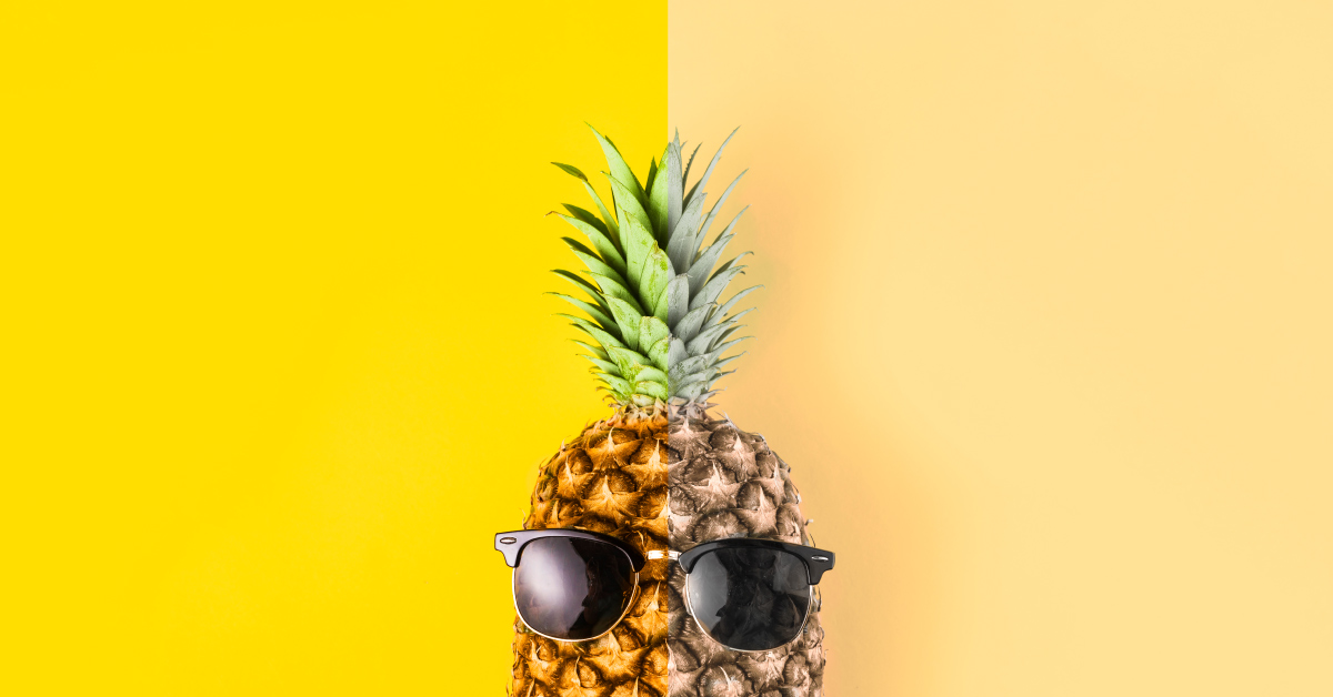 Half vibrant pineapple half dull pineapple