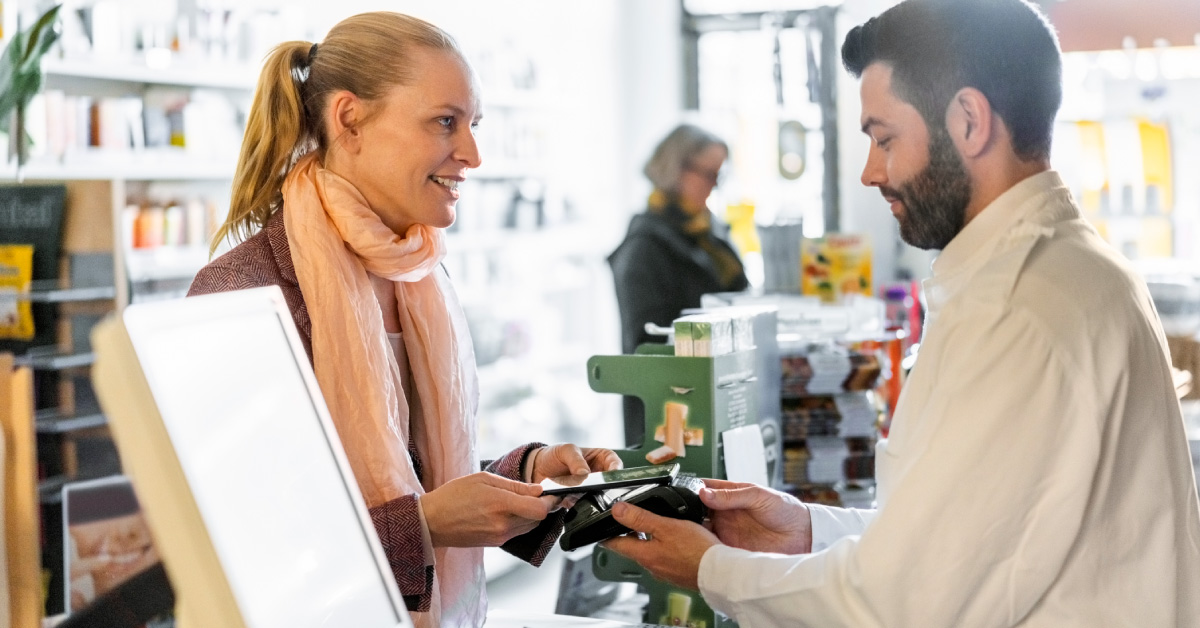 Customer checking out at office supply store