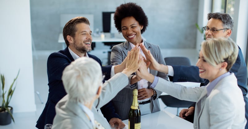 Team celebrating hard work