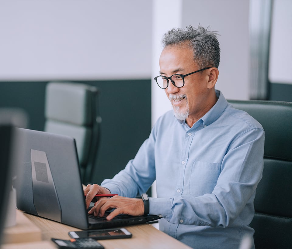 Professional working on laptop