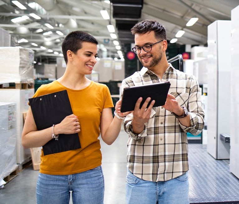 man and woman with tablet