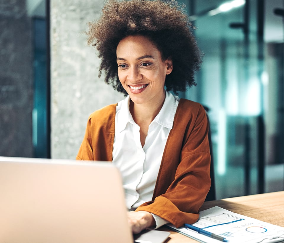 Business woman using laptop