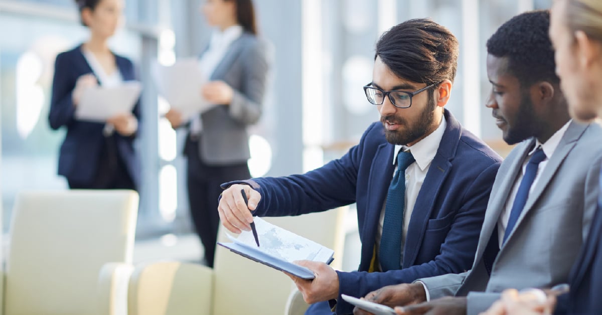 Businessmen having a review.