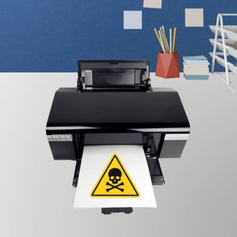 Printer printing picture of skull and cross bones hazard