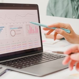 Employee analyzing data.