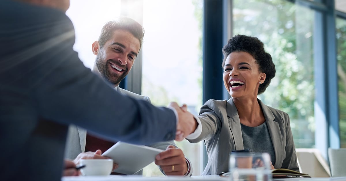 Business people shaking hands. 