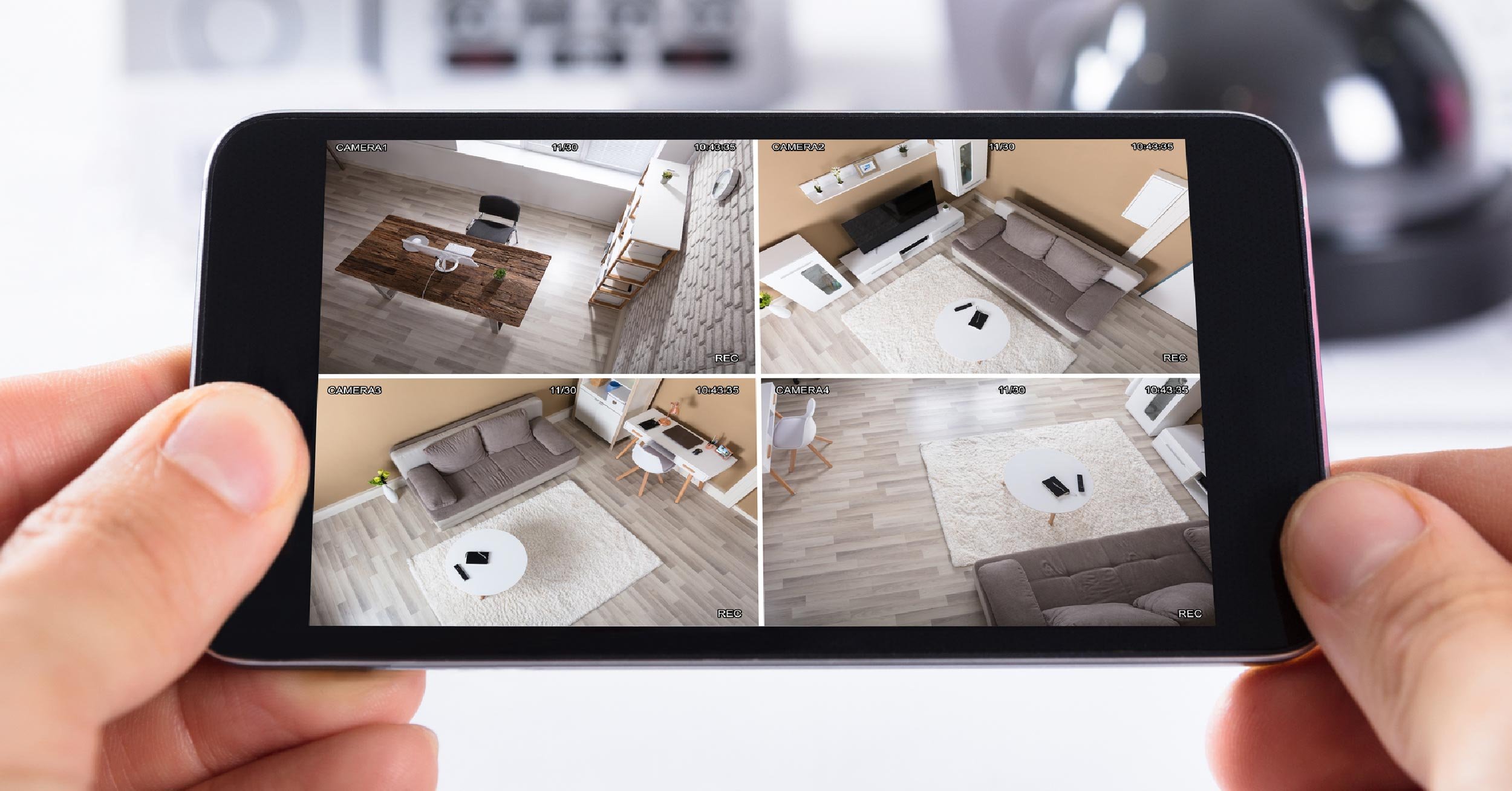 A business owner uses remote monitoring to make sure their physical location and assets are protected.