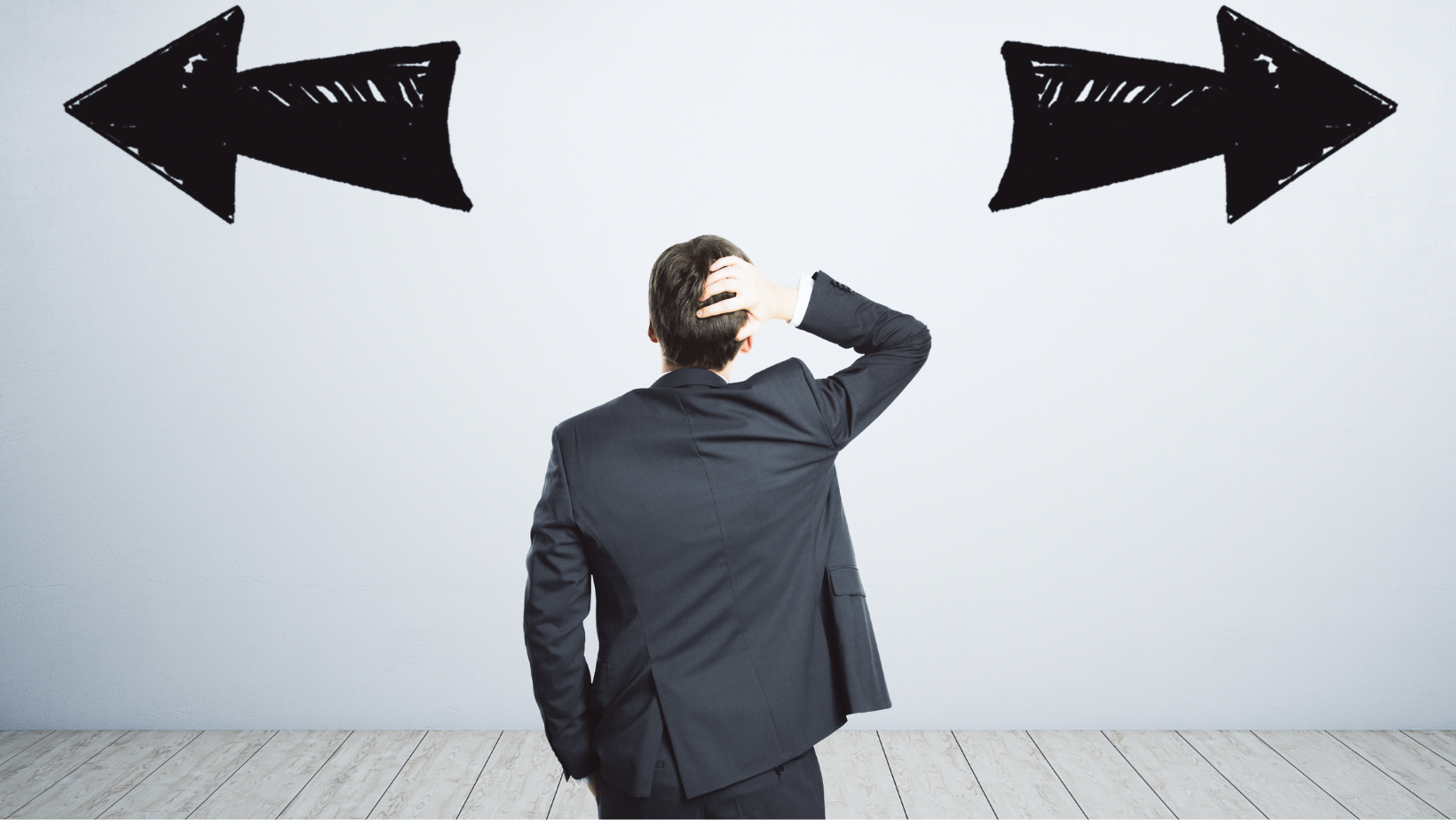 A business executive isn't sure which direction to take.