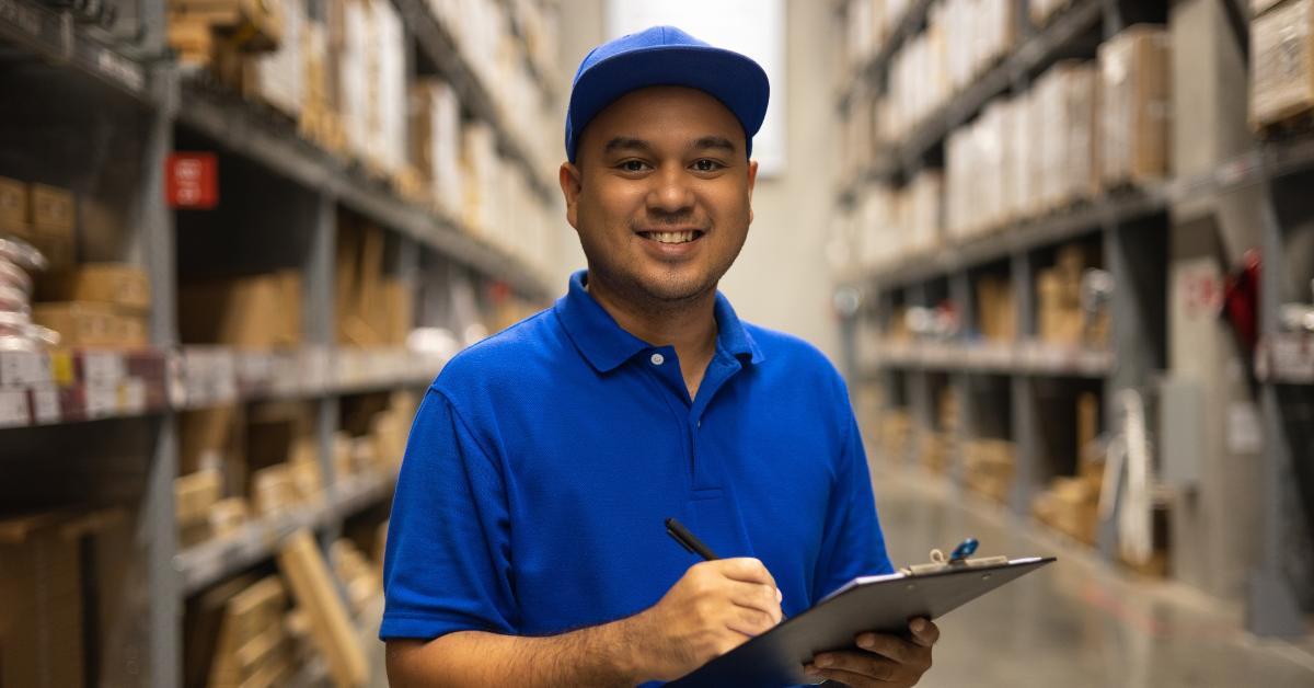 Operations manager with a clipboard of managed print questions. 